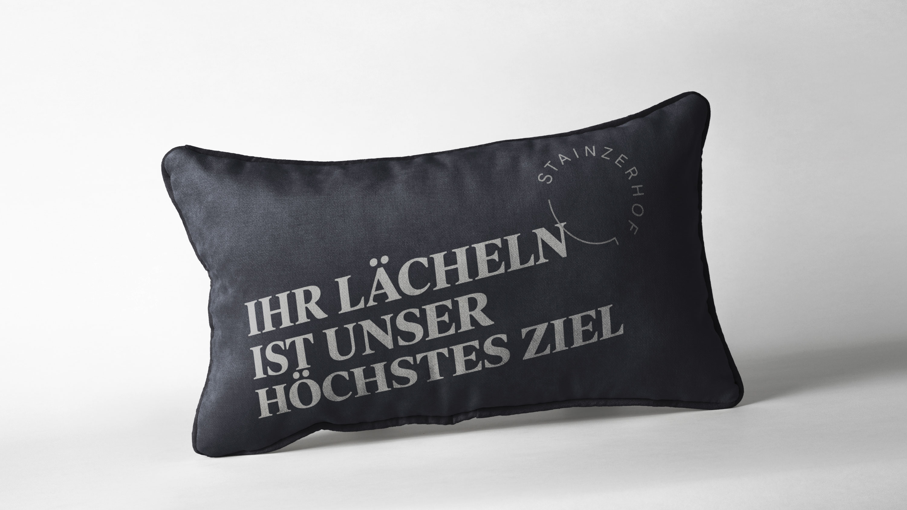 Stainzerhof Polster mit Slogan